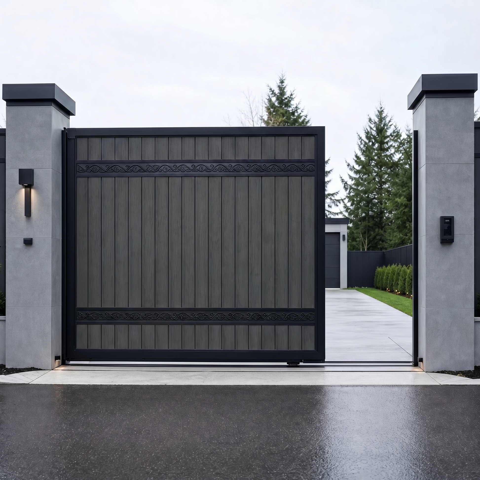 Dark grey electric sliding driveway gate with vertical WPC boards and scroll bands, sleek anthracite finish, motorised