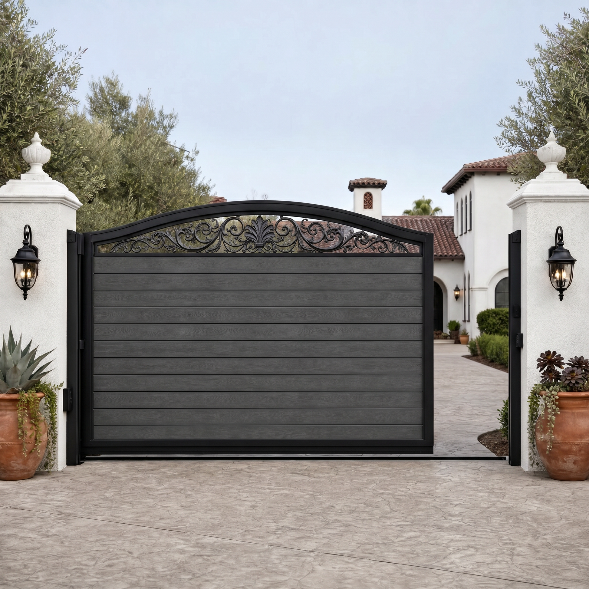 Dark grey automatic sliding driveway gate with horizontal WPC slats and arched scroll top, sleek anthracite finish